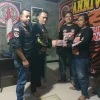 Foto : penyerahan seragam secara simbolis oleh ketua Korwil LSM harimau Pati timur.(Portalljateng/Rgl)